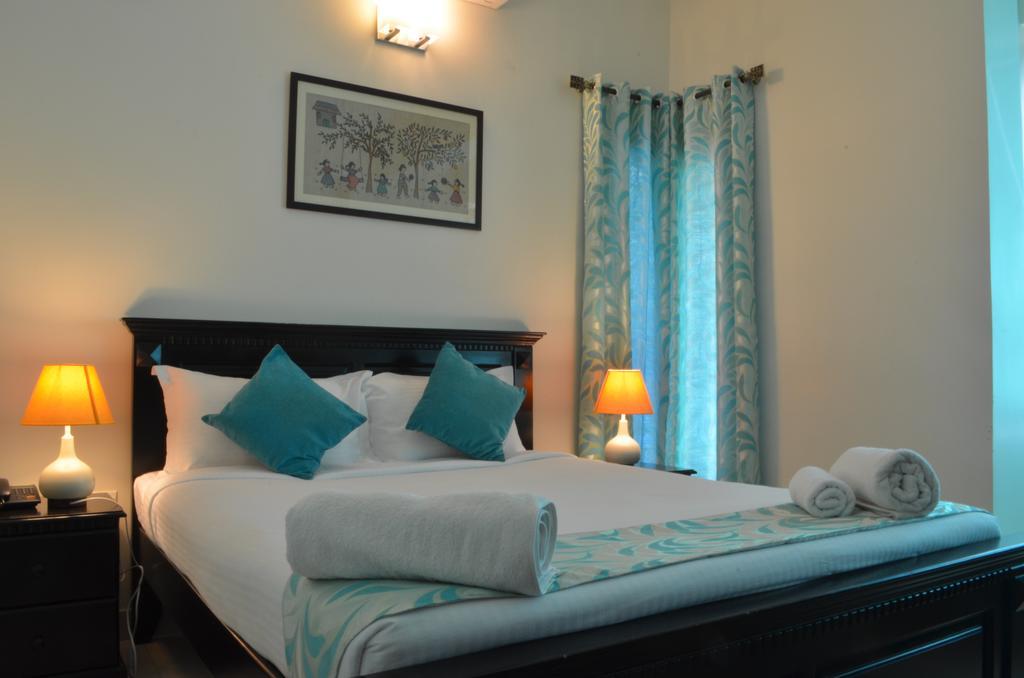 بنغالور Luxtay Suites الغرفة الصورة